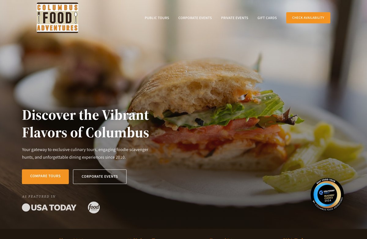 The Columbus Food Adventures home page on a laptop.