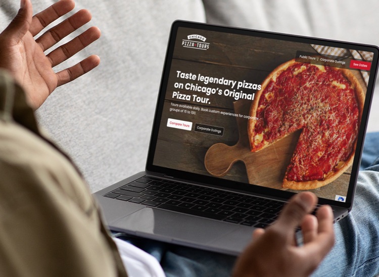 chicago-pizza-tours-website-on-computer-screen-person-lap